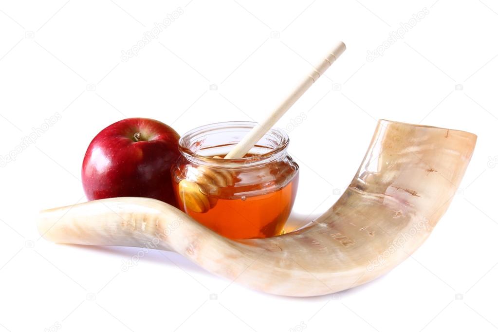 shofar (horn), honey, apple isolated on white. rosh hashanah (jewish holiday) concept . traditional holiday symbol.