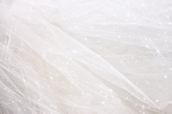 Vintage tulle chiffon texture background with glitter overlay. wedding concept