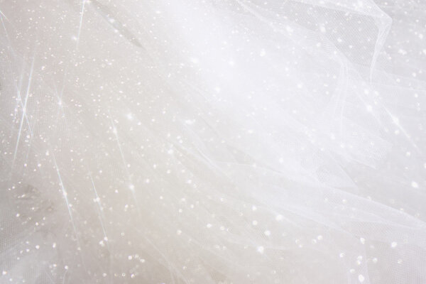 Vintage tulle chiffon texture background with glitter overlay. wedding concept