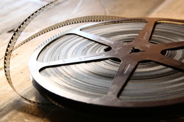 Üstten Görünüm görüntü eski ahşap arka plan üzerinde 8 mm film reel