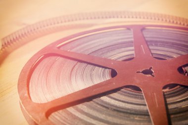 Üstten Görünüm görüntü eski ahşap arka plan üzerinde 8 mm film reel