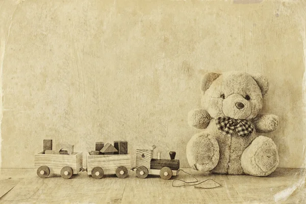 Toy train and teddy bear — Stock Fotó