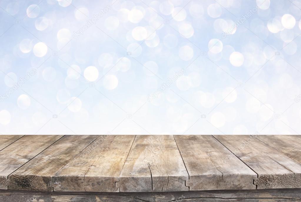 Wooden table in front lights