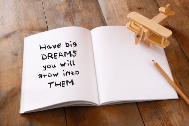 Open notebook with quote