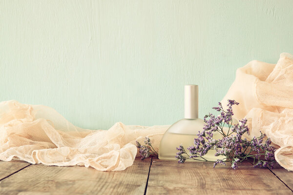 Perfume bottle with flowers