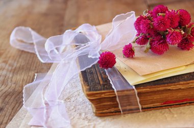 Dry flowers and book