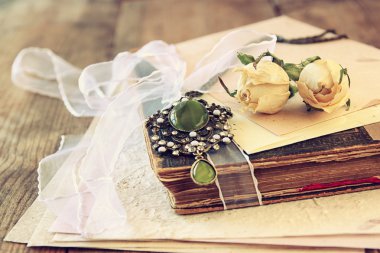 Dry roses and necklace