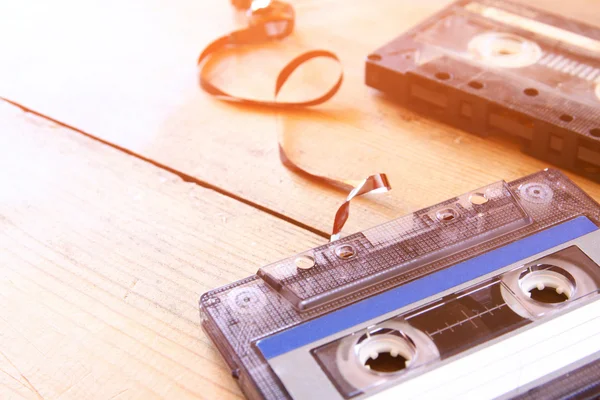 Cassette tape on wooden table — Stock Photo, Image