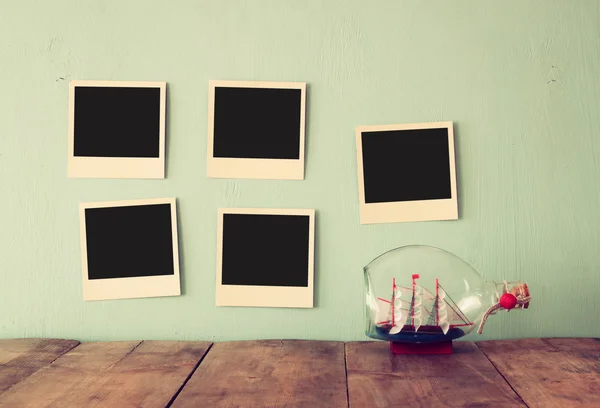 Blank instant photos on the wall — Stock Photo, Image