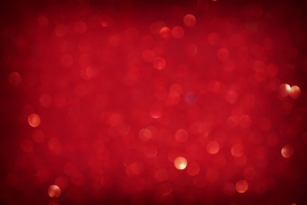 Abstract background of red and gold glitter bokeh lights, defocused — Stock Photo, Image