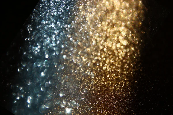 Glitter εκλεκτής ποιότητας φώτα φόντο. χρυσό και μαύρο. defocused. — Φωτογραφία Αρχείου