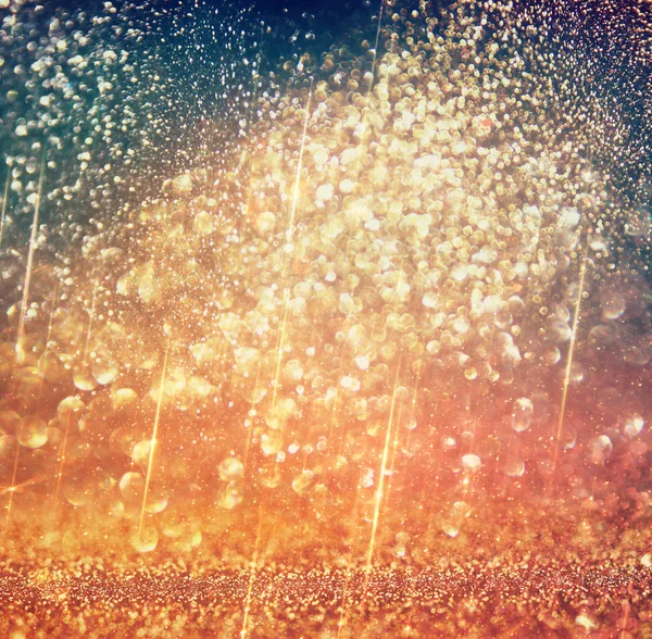 Glitter vintage luci di sfondo. oro e nero. sfocato . — Foto Stock