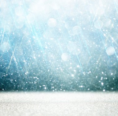bokeh lights background with multi layers and colors of white silver and blue. clipart