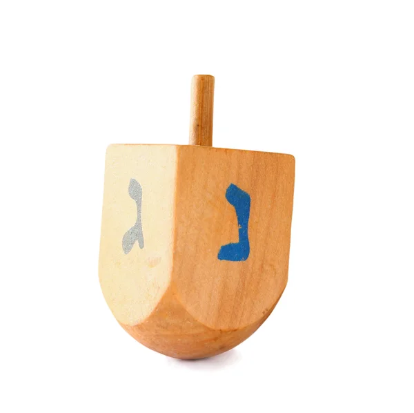 Dreidels coloridos de madeira (parte superior girando) para férias judaicas hanukkah isoladas no branco . — Fotografia de Stock