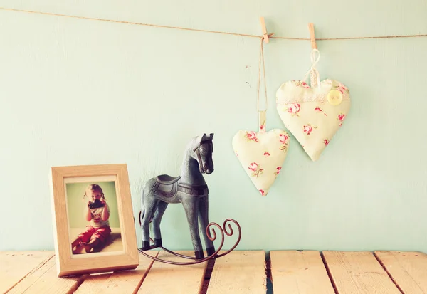 Vintage rocking horse and photo frame — 스톡 사진