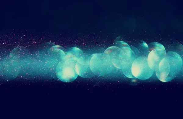 Abstract green glitter lights or Christmas background — Stock Photo