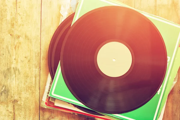 Records stack with record on top — Stock Photo, Image