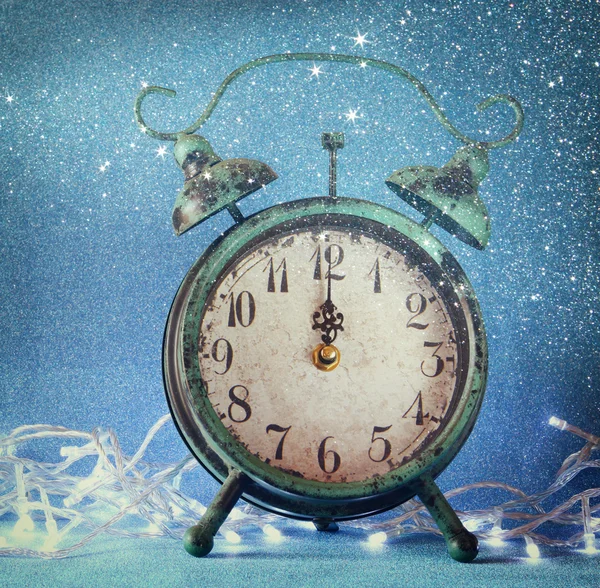 Clock over blue ice — Stock Photo, Image