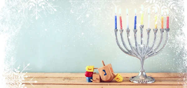 Website banner image of of jewish holiday Hanukkah with menorah (traditional Candelabra). retro filtered. glitter overlay. — Stock fotografie