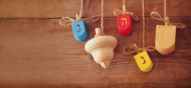 website banner image of of jewish holiday Hanukkah deridel (spining top)