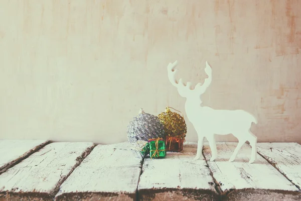 Christmas decorations and white raindeer — Stock Photo, Image