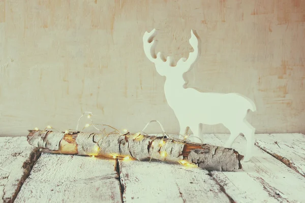 Kerstverlichting en rendieren — Stockfoto