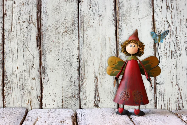 Cute fairy on wooden table — Stock Photo, Image