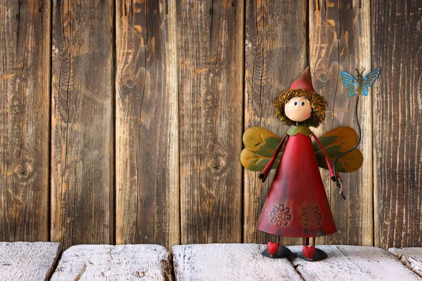 Cute fairy on wooden table — Stock Photo, Image
