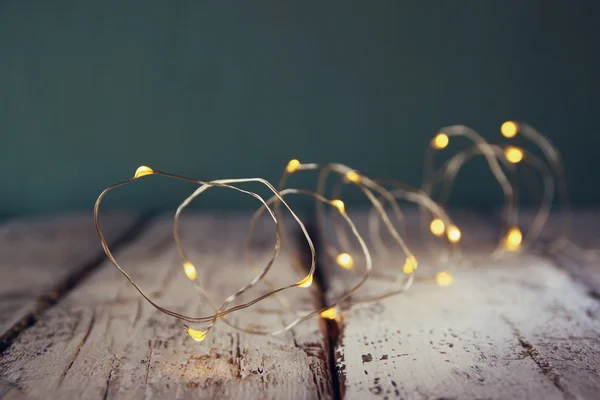 Natale caldo oro ghirlanda luci — Foto Stock