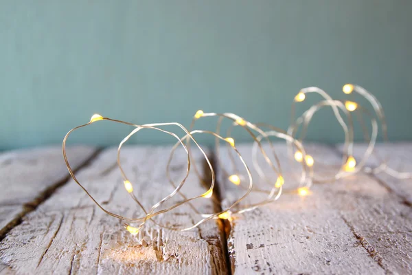 Natal luzes guirlanda ouro quente — Fotografia de Stock