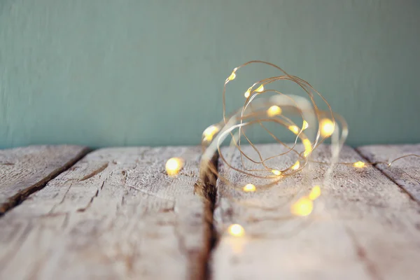 Navidad luces de guirnalda de oro caliente — Foto de Stock