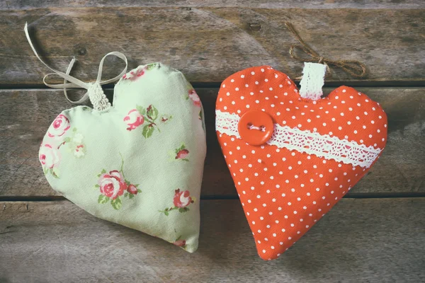 Top view image of colorful fabric heart on wooden table. valentine's day celebration concept. — Stok fotoğraf