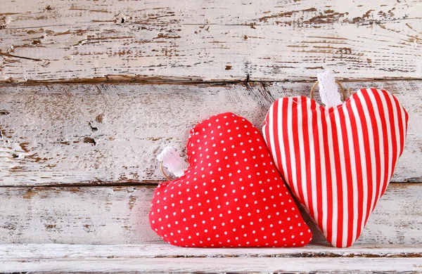 Image of colorful fabric heart on wooden table. valentine's day celebration concept. — Zdjęcie stockowe