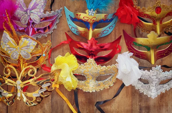 Top view of colorful Venetian masquerade masks. retro filtered image — Stock Photo, Image