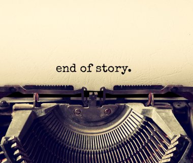close up image of typewriter with paper sheet and the phrase: end of story. copy space for your text. terto filtered