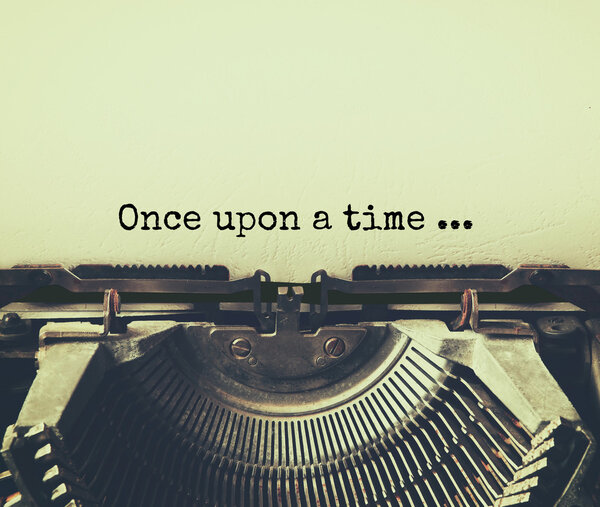 close up image of typewriter with paper sheet and the phrase: once upon a time . copy space for your text. terto filtered
