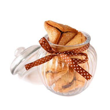 Purim celebration cookies (jewish carnival holiday). selective focus. isolated on white