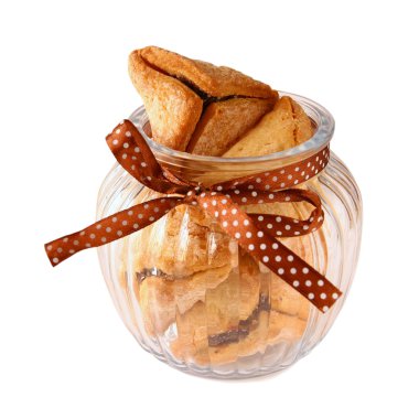 Purim celebration cookies (jewish carnival holiday). selective focus. isolated on white