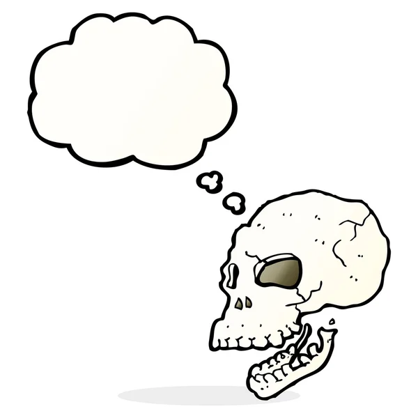 Cartoon spooky skull with thought bubble — Stock Vector