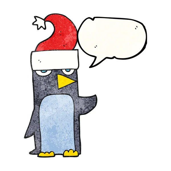 Speech bubble textured cartoon penguin in christmas hat — Stock Vector
