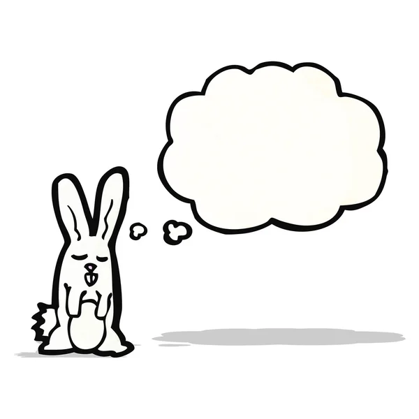 Cartoon rabbit with thought bubble — Stock Vector