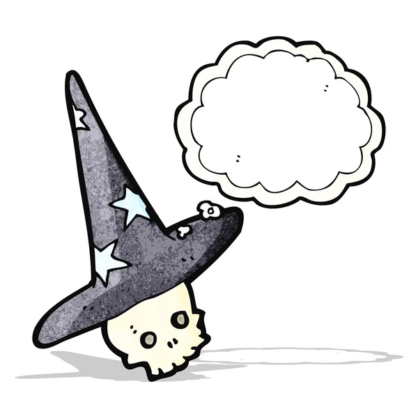 Spooky schedel in wizard hoed cartoon — Stockvector