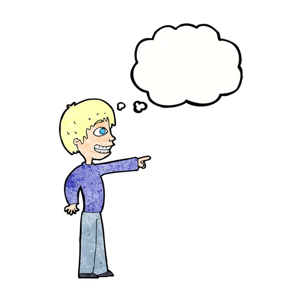 Karikatur grinsender Junge zeigt mit Gedankenblase — Stockvektor