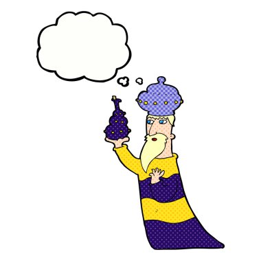 Düşünce baloncuğu olan üç bilge adamdan biri.