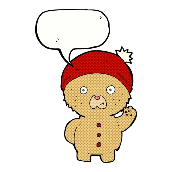 Dibujos animados ondeando osito de peluche en sombrero de invierno con burbuja de habla — Vector de stock