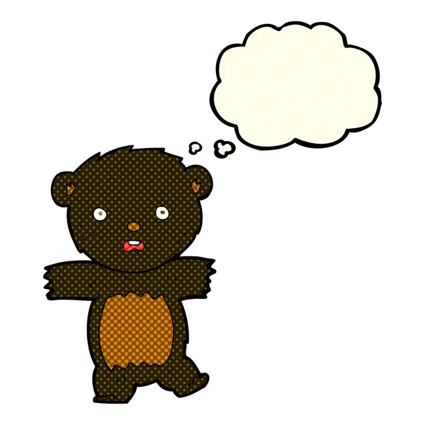 Cartone animato scioccato cucciolo di orso nero con la bolla discorso — Vettoriale Stock