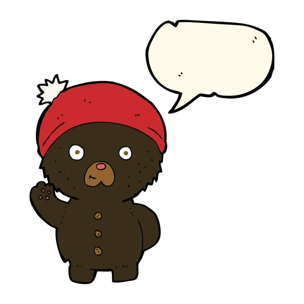 Desenho animado acenando urso de pelúcia preto no chapéu de inverno com bolha de fala —  Vetores de Stock