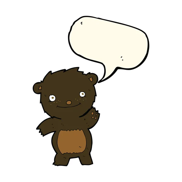 Cartoon waving black bear cub with speech bubble — Stock Vector