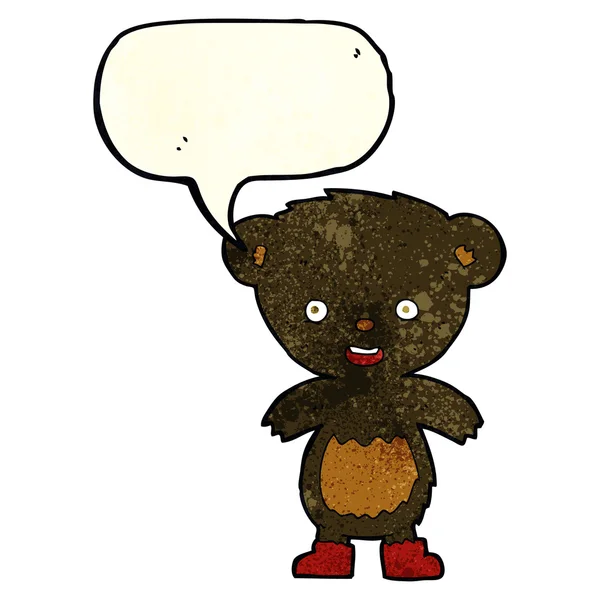 Dibujos animados negro oso cachorro con el habla burbuja — Vector de stock