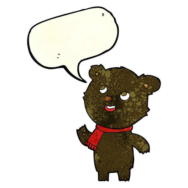 Cartoon black bear wearing scarf with speech bubble — Stock Vector